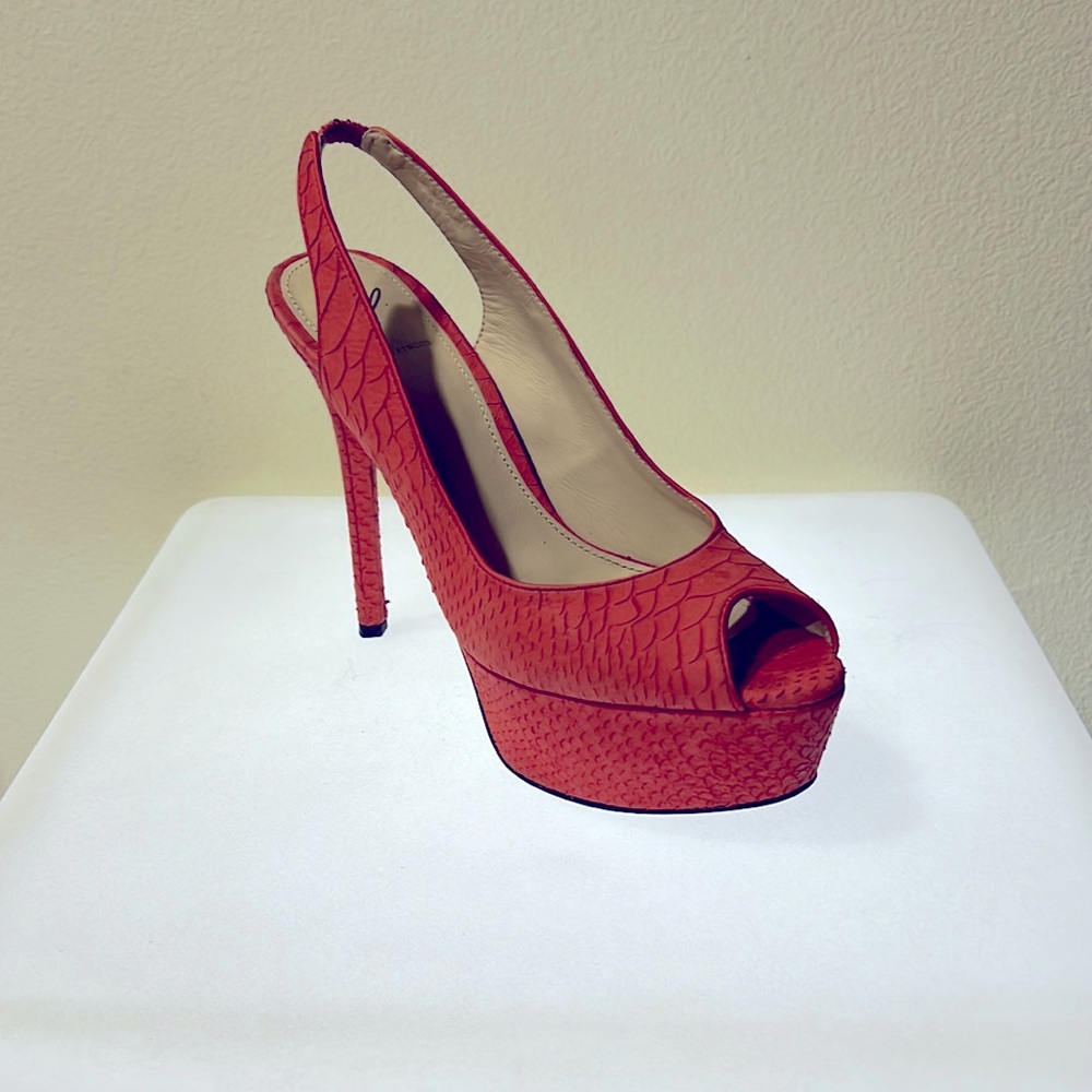 B Brian Atwood, beautiful slingback platform, comes with box and dust bag.
